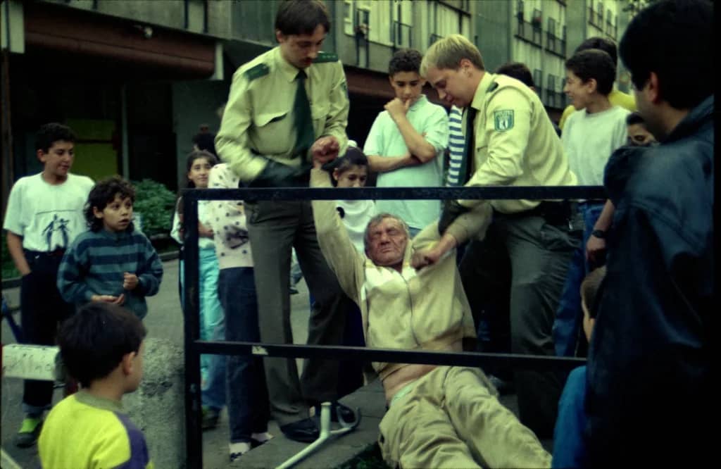 Police lifts up a drunkard in Liebenwalderstr, Wedding, 1990