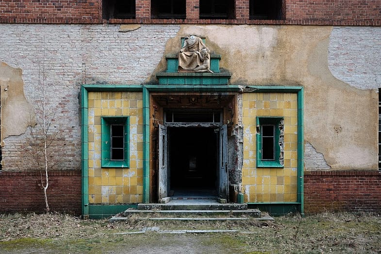 Decrepit entrance and decoration at Grabowsee sanatorium
